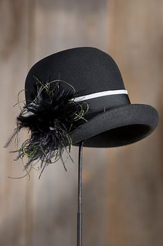 With its asymmetrical brim, wide two-tone ribbon hatband, and elegant tuft of… Unique Leather Jacket, Mad Hatter Hat, Pretty Hats, Flapper Hat, Mad Hatter Hats, Luxury Boots, Women's Hats, Cloche Hat, Peacock Feathers