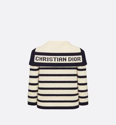 The virgin wool and cashmere knit Dior Marinière cardigan is adorned with the timeless D-Stripes motif in navy blue and ecru. Its cropped, fitted cut features contrasting navy blue edges and a sailor collar with the Christian Dior signature. Classic and modern at the same time, the cardigan will complete any outfit through the seasons.. 36 Dior Sweater, Denim Swimsuit, Blanket Poncho, Icon Shoes, Dior Book Tote, Christian Dior Couture, Sailor Collar, Short Denim, Dior Couture