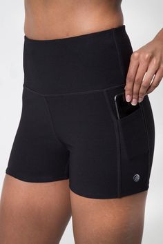 MPG biker shorts featuring exterior side pockets for holding electronics, this fitted hot short is updated with a comfortable high waisted design for added support. An essential addition to your active wardrobe, this "short-short" design is perfect for wearing when things start heating up thanks to stretchy, breathable, moisture wicking performance fabric. FEATURES Performance Jersey An advanced fabric blend with 4-way stretch, shape retention & moisture wicking properties New High-Class Col Adaptive Clothing, Women Attire, Diva Boutique, Boys With Tattoos, Sports Clothes, Essential Shorts, Ripped High Waisted Jeans, Workout Shorts Women, Swimming Wear