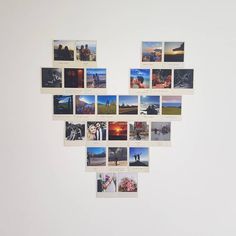 a white wall with several pictures arranged in the shape of a heart