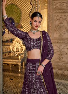 Purple Sequence Embroidered Georgette Lehenga Choli Shop Latest indian Wedding Lehengas With Free International Shipping. will make you look more beautiful on this wedding season with indian ethnic essence. This set comprises of traditional zari and sequence embroidery work on georgette choli paired with all over equally embellished georgette lehenga with santoon lining and cancan detail. The beauty part is it’s border and butti embroidered georgette dupatta. Style this set with heels and golden Lehenga Purple, Plus Size Lehenga, Embroidery Dupatta, Bridesmaid Lehenga, Georgette Lehenga, Sequence Embroidery, Wedding Lehengas, Lehenga Choli Online, Party Wear Lehenga