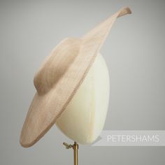 Get Royal Ascot ready with this extra large pointed tip Latte Brown sinamay fascinator base! Made from a triple layer of stiffened sinamay millinery fabric and is ideal for making an instant hat. This shape has a lovely pointed tip and a shallow crown. Get creative by positioning it at different angles on the head! Just add a headband for securing to the head (not included but available in our shop!) *This is not a fitted hat! You will need to sew in a headband or comb to attach it to your head* Fitted Sinamay Straw Hat With Curved Brim, Fitted Sinamay Boater Hat With Curved Brim, Fitted Sinamay Boater Hat With Flat Brim, Curved Brim Sinamay Straw Hat For Royal Ascot, Fitted Wide Brim Sinamay Straw Hat, Beige Sinamay Mini Hat With Curved Brim, Fitted Beige Sinamay Mini Hats, Canterbury England, Wedding Birdcage