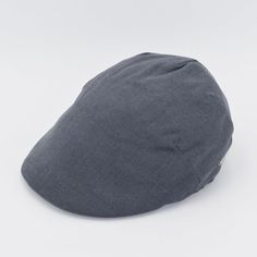 a gray hat on a white background