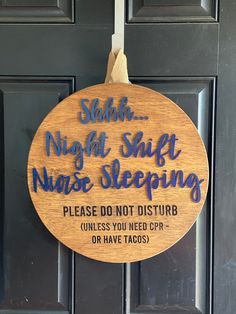 a wooden sign that says night shift nurse sleeping please don't disturb unless you need crr or have tacos