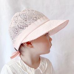 This lace hat is a must-have accessory for mothers looking to coordinate their baby's outfit in the summer. The hat is made of soft material and comes in trendy colors that are perfect for baby girls Specifications: The hat is perfect for school, outdoor activities, sun protection, and wind coverage. With its bright colors and super cute patterns, your baby will love wearing this hat. The seams are even, beautiful, and strong, ensuring that the hat won't tear or break easily. The hat can be hand Pink Curved Brim Hat For Playtime, Spring Playtime Hats With Uv Protection, Cute Beach Bonnet One Size, Pink Sun Hat For Summer Playtime, Cute Adjustable Bonnet For Summer, Cute Beach Bonnet With Curved Brim, Spring Adjustable Hats For Play, Playful Spring Hats For Play, Cute Beach Bonnet