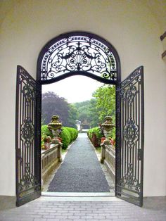 an open door leading into a garden