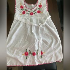 Never Worn Hand Made Dress With Belt Purchased In Mexico. Says Size 6 But Fits Like A Us 4. Item Will Be Steamed Straight Prior To Shipping. Cute White Dress With Embroidered Hem, Cute Embroidered White Dresses, Cute White Embroidered Dresses, Cute White Dress With Floral Embroidery, Multicolor Cotton Embroidered Dress With Embroidered Hem, Red Short Sleeve Dress With Embroidered Hem, Red V-neck Embroidered Summer Dress, Beach Embroidered Dress With V-neck And Embroidered Hem, Embroidered Dress