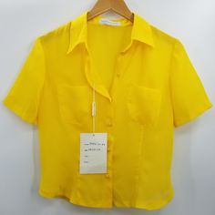 Franca Gualtieri Yellow Button Short Sleeve Sheer Blouse Size 44 Italy Which Is Equivalent To A Us Large 100% Polyester Measurements Are Taken Laying Flat And Are Approximate Colors May Differ Slightly From Photos Based On The Device Used To View & Color Settings. Fast Shipper All Items Have An Inventory Tag Attached Which Ensures You're Getting The Item Pictured And Must Remain Attached For A Return 20541 Collared Blouse With Button Closure For Day Out, Collar Blouse With Button Closure For Day Out, Blouse With Button Closure And Collar For Day Out, Summer Workwear Blouse With Snap Buttons, Collared Summer Blouse With Buttons, Yellow Summer Office Shirt, Summer Collared Blouse With Button Closure, Summer Office Shirt With Buttons, Summer Office Shirt With Back Button Closure