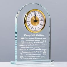 a clear glass clock with a poem on the front and back side that says happy 50th