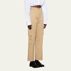 Miu Miu chino pants with cargo pockets and embroidered back logo High rise Side slip pockets; back flap-buttoned pockets Flat front Straight leg Full length Raw edge hem Button/zip fly; belt loops Cotton Dry clean Made in Italy Casual Cotton Miu Miu Bottoms, High-waisted Workwear Bottoms With Flap Pockets, High-waisted Pants With Flap Pockets For Work, High-waisted Parachute Pants With Multiple Pockets For Work, Fitted Straight Pants With Flap Pockets, Workwear Straight Parachute Pants With Flap Pockets, Workwear Parachute Pants With Flap Pockets, Casual Miu Miu Bottoms With Pockets, Straight Hem Cargo Pants With Side Pockets For Workwear