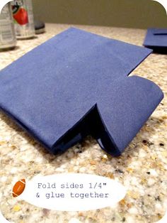 a blue piece of paper sitting on top of a counter