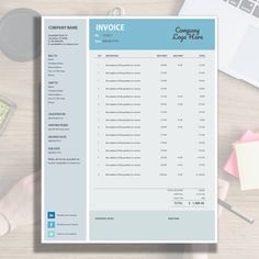 a blue invoice sitting on top of a wooden table