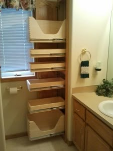 the bathroom is clean and ready to be used as a storage area for towels or other items