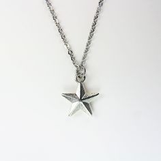 ♥ Star Necklace Sliver Star Charm Necklace Star Pendant Birthday Gift Mother's Gift Christmas Gift Personalized Gift ♥ This is a beautiful Star charm with ♥ You will receive 1 necklace ♥ Star charm 16x14x4 mm ♥ Stainless steel chain 18 inches ♥ We strive for next day shipping, but we do not ship on Saturdays, Sundays, and Holidays. It may sometimes take a bit longer when we have unusually large volume of orders. Thank you for your patience! ♥♥ For more details on shipping guideline and other pol Silver Star Charm Necklace For Anniversary, Silver Star Charm Necklaces For Anniversary, Silver Star Charm Jewelry For Birthday, Silver Star Charm Necklace For Gift, Silver Birthday Jewelry With Star Charm, Silver Jewelry With Star Charm For Birthday, Star-shaped Charm Necklace For Gift, Silver Star-shaped Jewelry For Birthday, Silver Star-shaped Birthday Jewelry