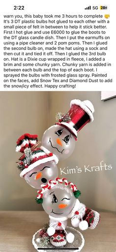 two snowmen wearing hats and scarves on top of each other, with the caption