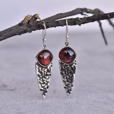 ✦ Introducing our natural red garnet earrings! This unique bohemian inspired design features healing stones that is as unique and real as you are.. Our natural red garnet earrings are perfect for anyone who loves celestial and meaningful jewelry. With their simple and elegant design, these earrings are truly one-of-a-kind. Garnet is known as a healing stone, making these earrings even more special. The recipient is sure to cherish them for years to come! 💎  Please Note As with all Natural Gemst Garnet Gemstone Earrings, Garnet Drop Earrings As Gift, Garnet Dangle Jewelry For Weddings, Handmade Elegant Garnet Earrings, Garnet Dangle Earrings For Wedding, Elegant Handmade Garnet Earrings, Wedding Garnet Dangle Jewelry, Wedding Dangle Garnet Jewelry, Garnet Gemstone Earrings As A Gift