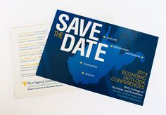 the save the date brochure is on display