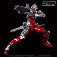 the action figure is posed in red and silver