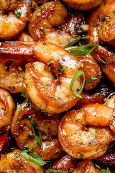 cooked shrimp with herbs and seasoning in a pan