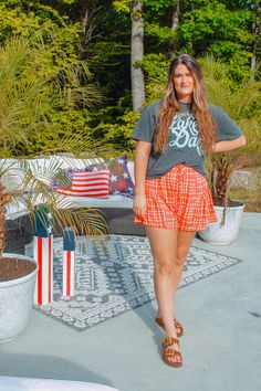 The perfect Americana shorts are here, to wear to EVERY Holiday this Spring/Summer! - Flowy short that feature a ruffle detail at the side and a red and white check print through out with a tie waist - Fit true to size - Model is in a size Medium - Fabric: 100% Polyester - Paired with our Lake Daze Crop Tee * due to screens and filters colors may vary slightly to photos * Summer Plaid Shorts With Built-in Shorts, Red Spring Bottoms For Picnic, Red Bottoms For Spring Picnic, Red Summer Bottoms For Picnic, Red Bottoms For Summer Picnic, Summer Plaid Bottoms With Built-in Shorts, Summer Vacation Plaid Shorts, Plaid Bottoms With Built-in Shorts For Summer, Plaid Skorts With Built-in Shorts For Summer