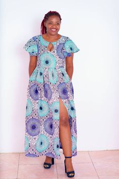 African print short sleeve maxi dress. Capelet sleeves. Ankle length.  Side split. Short Sleeve Maxi Dress With Side Slits For Vacation, Vacation Maxi Dress With Side Slits And Short Sleeves, Summer Dresses With Short Sleeves And Side Slits, Summer Dresses With Side Slits And Short Sleeves, Summer Dress With Side Slits And Short Sleeves, Casual Short Sleeve Maxi Dress With Side Slits, Spring Short Sleeve Maxi Dress With Side Slits, Casual Maxi Dress With Side Slits, African Print Maxi Dress