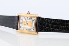 Genuine Cartier watch. Vintage Iconic Tank Argent. Sterling Silver and Gold plated (Vermeil). Comes with a new Black leather band. QUARTZ Condition: No cracks on the face or sapphire. Has some discoloration on the sides that is consistent with age. New Battery installed. Details: 23mm by 31mm Case Original Red Cartier Box. Tricolor Trinity Dial Please ask for more details, photos or videos. Cartier Tank Francaise, Tank Watch, Cartier Jewelry, Cartier Watch, Watch Vintage, Wrist Watches, Leather Band, Tri Color, Sterling Silber