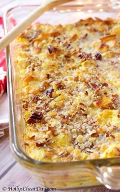 a casserole dish with cheese and nuts in it, ready to be eaten