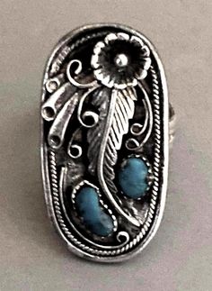 *The size is 10.5 US.  *The ring is not signed or stamped. My age estimation is the 1960s decade. The silver and stones are genuine.  *This beautiful ring has unisex appeal, especially given its size.  *It is from my own collection of vintage southwestern turquoise jewelry. *Very good pre-owned-used condition with an old patina & tarnish as shown.  *Be certain to review the 9 photos to further assess condition and features.  *Questions welcome-Start a convo prior to checkout.  *Please note that Southwest Design, Native American Rings, Sterling Jewelry, Louisville Ky, Beautiful Ring, Turquoise Jewelry, Rings Statement, Beautiful Rings, 5 Star