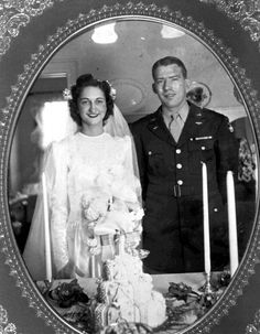 an old black and white photo of a bride and groom