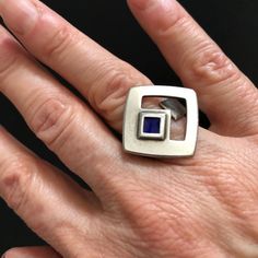 "This stunning modernist ring was designed by Mirella Forlivesi for the Italian jewelry firm, UnoAErre. Forlivesi was born in 1936 and gained renown as an artist, influenced by mid-century modernism and industrial design. Although primarily a painter, she was commissioned by UnoAErre to create original designs for its high end jewelry. UnoAErre, founded in 1926, drew on Italian goldsmithing traditions dating back to ancient Etruscan times and became a leading jewelry company worldwide. The first Jewelry History, Art Nouveau Ring, High End Jewelry, Modernist Ring, Modernist Jewelry, Special Ring, Italian Jewelry, Art Deco Necklace, Aquamarine Jewelry