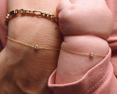 Matching heirloom diamond bracelet set for mother and daughter or best friends of any age. A small token for a lifetime of love. Not recommended for unsupervised children under 3 years old. Two 3mm Bezel Set Stones, 0.20 -0.22tcw. H-I / SI White Diamonds. Adult bracelet is adjustable and can be worn 6 to 7in. Child bracelet can be worn 5 to 6in and baby bracelet can be work 4 to 5in. Starling Jewelry, Mother Daughter Bracelet Set, Daughter Bracelet, Mother Daughter Bracelets, Mom And Daughter Matching, Emerald Bracelet, Baguette Diamond Rings, Newborn Baby Photos, Baby Bracelet