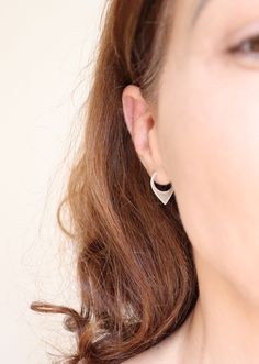 This pair of hoops are made from sterling silver and they come with butterfly ear backs. They are 20 mm long and 15 mm wide. If your ears can handle a bigger gauge I can make this pair a sleeper one without the need to have an ear back. If you prefer it smaller, have a look here: https://www.etsy.com/listing/628994062/small-hoops-sterling-silver-geometric?ref=shop_home_active_9&crt=1 Each pair is handmade to order and may slightly vary from the pictures. Please allow for subtle variations ma Modern Nickel Free Cartilage Earrings For Everyday, Modern Nickel-free Cartilage Earrings For Everyday, Modern Nickel-free Everyday Cartilage Earrings, Modern Small Hoop Cartilage Earrings, Modern Huggie Wrap Earrings, Modern Silver Wrap Earrings For Everyday, Nickel-free Modern Sterling Silver Cartilage Earrings, Modern Nickel-free Sterling Silver Cartilage Earrings, Modern Sterling Silver Pierced Huggie Earrings