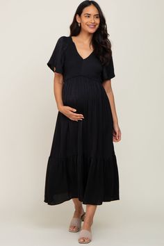 Black Satin Smocked Maternity Midi Dress – PinkBlush Solid Color Short Sleeve Maternity Dresses, Maternity Midi Dress With Smocked Back, Solid Color Short Sleeve Maternity Summer Dress, Solid Color Short Sleeve Maternity Dress For Summer, Bump Friendly Short Sleeve Maternity Dress, Bump-friendly Short Sleeve Maternity Dress, Bump Friendly Maternity Dress With Short Sleeves, Flowy Short Sleeve Maternity Dress, Modest Short Sleeve Maternity Dress