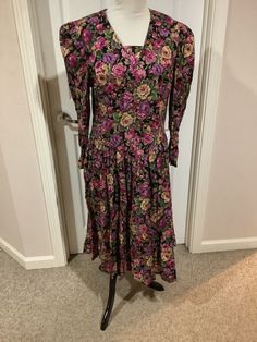 This nice 90s purple tan black floral bold fall print puff sleeve prairie dress comes to you in a size M. Princess waistline. Perfect for fall. Pls compare the measurements I give you to those in your closet. They are as follows- Fitted Long Sleeve Vintage Dress, Purple Puff Sleeve Dress For Fall, Long Sleeve Vintage Dress With Floral Print For Summer, Fitted Casual Vintage Dress With Floral Print, Casual Fitted Vintage Dress For Fall, Fitted Vintage Midi Dress With Floral Print, Vintage Long Sleeve Dresses For Fall, Fitted Floral Print Fall Dress, Purple Fitted Dress For Fall