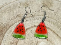 Adorable translucent watermelon earrings made with acrylic and resin. Resin bead is 30 long with Stainless steel earring hooks. Hypoallergenic Earrings For Summer Party, Fun Red Resin Jewelry, Handmade Red Plastic Earrings, Fun Red Resin Earrings, Green Resin Fun Earrings, Handmade Plastic Dangle Earrings, Green Resin Earrings For Summer, Fun Style Red Resin Earrings, Summer Glass Earrings For Gift