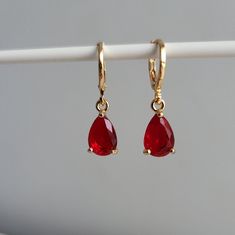 Ruby Red & Crystal Teardrop Teardrop Jewel Huggie Hoop Earrings, 14k Gold Plated Earrings, Vintage Style Earrings, Victorian Earrings  Product specifications: * Material: 14K Gold Plated Brass * Size Each charm measures 1 cm x 0.7cm Earring Options: * 8mm inner diameter hoops * 10mm inner diameter hoops Packaging and Gifts: * All pieces of jewellery are set on a card in a mesh jewellery pouch  Shipping: * All Australian orders will be shipped out within 1 - 3 days by standard untracked letter po Red Teardrop Hoop Earrings, Red Teardrop Hoop Earrings With Ear Wire, Red Teardrop Hoop Earrings For Pierced Ears, Red Hypoallergenic Dangle Hoop Earrings, Red Huggie Earrings For Anniversary, Victorian Earrings, Vintage Style Earrings, Red Crystals, Huggie Hoop Earrings