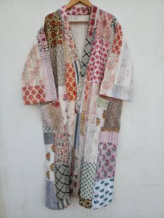 This Kimono is made of hand Kantha stitch fabric in patchwork . The fabric is a handmade printed fabric. Kantha stitch over the fabric gives it a unique look. It is two Layer of Cotton Kantha Stitch (Hand Quilted) Fabric Robe Size : Free size Length: 50 Inch ( 125 Cms.). Note: Due to patchwork theme there may be little difference in patches and color combination. Bog Coats, Quilt Coats, Night Wear Dress, Kantha Silk, Recycled Dress, Patchwork Fashion, Kantha Fabric, Boho Denim, Kantha Jacket