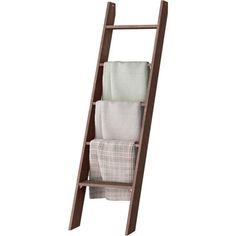 a wooden ladder with towels on it