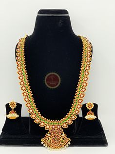 Original Design by Classical Dance Jewelry® -- Colorful And Designer Beautiful Necklace Set For Women. -- You Can Wear this Necklace Set In Parties, Engagement, Weddings, Birthdays, Bharatnatyam And Kuchipudi Dance Performances. -- Handmade Indian Item. -- Size 14 inchs long approxiamately PLEASE NOTE ❥ ALL SALES ARE FINAL ✅ ❥ No Return/ No Exchange / No Cancellation! ❥ ❥❥ Disclaimer: ❥ We will take every effort to keep your order as close as possible. But sometimes it gets out of control and we Multicolor Temple Necklace For Diwali, Multicolor Temple Necklace With Zari Work For Festivals, Multicolor Temple Necklace With Latkans For Puja, Multicolor Pallu Temple Necklace For Diwali, Multicolor Chandbali Temple Necklace For Puja, Multicolor Temple Necklace With Pallu For Diwali, Temple Jewelry Sets With Zari Work For Celebrations, Green Temple Jewelry Tikka For Celebration, Multicolor Temple Jewelry Sets With Tilla