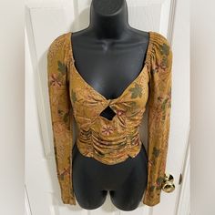 Nwot! Bought Years Ago And Just Never Wore Unfortunately So I Am Selling Mustard Yellow Color, With A Floral Print Material Is 100% Viscose, It’s A Very Lightweight Fabric And Super Soft And Comfy! Message Me With Any Questions! Stretch Yellow Tops With Floral Print, Fitted Yellow Top From Urban Outfitters, Fitted Mustard Top For The Beach, Fitted Mustard Top For Beach, Urban Outfitters Yellow Crop Top For Spring, Yellow Urban Outfitters Crop Top, Fitted Yellow Crop Top For Fall, Fitted Yellow Floral Print Crop Top, Yellow Urban Outfitters Top For Vacation