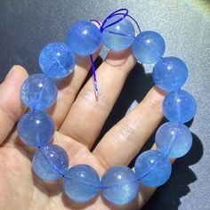 Material:Natural aquamarine beads size :Approx 18mm (Because it is measured manually, the size may vary, 0.5mm-1mm)and the size of each bead is exactly the same. If you mind, please do not buy it. Thank you for understanding   color:blue quantity: one strand  6mm approx 29 pcs one strands 7mm approx25 pcs one strands 8mm approx 22 pcs one strands 9mm approx 21pcs one strands 10mm approx 19 pcs one strands 11mm approx 18pcs one strands 12mm approx 16 pcs one strands 13mm approx 16 pcs one strands Handmade Light Blue Crystal Bracelet With Round Beads, Handmade Aquamarine Beaded Bracelets, Light Blue Aquamarine Beaded Bracelets As Gift, Handmade Light Blue Aquamarine Bracelets, Light Blue Aquamarine Beaded Bracelets For Gift, Handmade Blue Aquamarine Bracelets, Light Blue Gemstone Beaded Bracelets For Healing, Light Blue Crystal Bracelet With Round Beads For Gifting, Aquamarine Natural Stone Beaded Bracelets