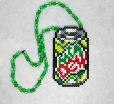 a beaded cell phone case with a green lanyard on it and a chain attached to it