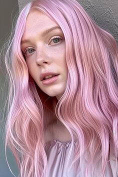 Blush pink is a soft, delicate color that adds a romantic flair. It flatters pale skin by providing a gentle, feminine touch. Click here to check out more best hair colors for pale skin to try. Pale Skin Pink Hair, Pink Hair Pale Skin, College Hair, Pale Pink Hair, Spring Hair Color Trends, Pastel Rainbow Hair