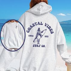 sweatshirts for women trendy (2 sided hoodie) trendy sweatshirt, hoodies for women aesthetic, oceancore Beach Shirts: https://etsy.me/3rOIGBS Beach Sweatshirt: https://etsy.me/3pdRnVI Beach Hoodie: https://etsy.me/37eabgO OUR SIZING IS ADULT UNISEX. This means it will be larger than normal women's sizing.  Please see photos for size charts 🌻 Please read the full description:   This hoodie/sweatshirt sizing is NOT oversized.  You need to order at least 1-2 sizes larger for the extra baggy look i Trendy Beach Season Hoodie Sweatshirt, Trendy Hooded Sweatshirt For Beach Season, Beach Season Hoodie Sweatshirt, Trendy Graphic Print Hoodie For Beach Season, Hooded Letter Print Sweatshirt For Surfing, Long Sleeve Hoodie With Letter Print For Surfing, Casual Letter Print Hoodie For Beachwear, Hooded Sweatshirt With Letter Print For Surfing, Trendy Beach Season Hoodie With Letter Print