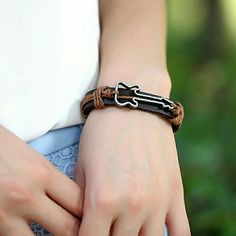 Brown Leather Bracelet With Silver Guitar Leather Bracelet For Skateboarder, Guitar Bracelet, Adjustable Hand-tooled Brown Leather Bracelet, Adjustable Hand-strung Brown Leather Bracelet, Silver Guitar, Vintage Hand-tooled Brown Leather Bracelet, Brown Hand-strung Spiritual Leather Bracelet, Brown Leather Bracelet, Mens Accessories Jewelry