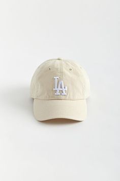 Paneled baseball cap by '47 Brand with a logo embroidered at the front. Features a curved brim & finished with an adjustable strap at the back.Features. Baseball hat from '47 New York Dodgers embroidery Adjustable strap closure Content + Care. 100% Cotton Spot clean Imported Size. Circumference: Adjustable Collegiate Six-panel Adjustable Baseball Cap, Adjustable Collegiate Six-panel Baseball Cap, Collegiate Baseball Cap With Curved Brim For Baseball Season, Collegiate Baseball Cap With Curved Visor For Baseball Season, Collegiate Adjustable Dad Hat With Curved Visor, Baseball Cap With Letter Patch For Baseball Season, Embroidered Logo Baseball Cap With Curved Visor, College Baseball Cap With Embroidered Logo, Curved Bill Baseball Cap With Letter Patch