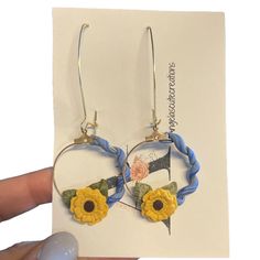 These Beautiful And Stunning Handmade Earrings Are One Of A Kind. They Are Lightweight, Flower Is Based On A Circle Hoop, And It Hangs From A Oblong Wire Closure. Colors Yellow, Brown, Blue, Blue Round Jewelry For Spring, Round Blue Jewelry For Spring, Blue Round Spring Jewelry, Handmade Small Hoop Yellow Earrings, Handmade Yellow Small Hoop Earrings, Trendy Blue Flower Earrings, Handmade Yellow Drop Hoop Earrings, Trendy Handmade Flower Hoop Earrings, Single Yellow Small Hoop Earring