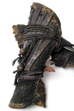 an old pair of gloves is tied up