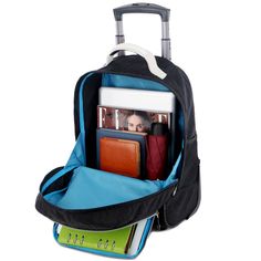 the back pack is packed with books and other items