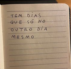 an open notebook with writing on it and the words tem dias que so no ottao dia mesmo